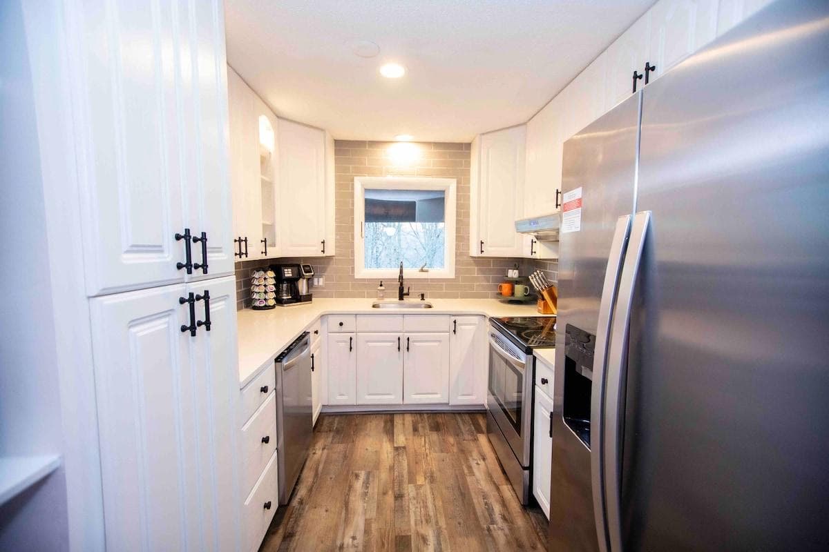 Kitchen with granite counter tops and stainless steel appliances